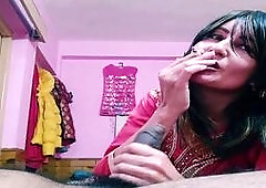 Sexy milf Bolly Karma gives a handjob and plays while enjoying a smoke