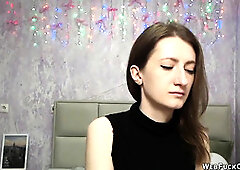 Amateur brunette flashes tit on webcam show