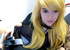 Teasing redhead teen in white stockings stripes on bed