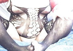 Horny babe wears skimpy nylon suit that barely covers their tits and stomach. Their feet look so sexy in the nylon and legs look good too. Such a soft