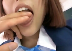 Asian coed sucking cock in class