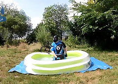 Cyclist Pup In Pool - Cooling Down And Pawing Off