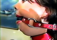 Marie, bound and gagged, dancing