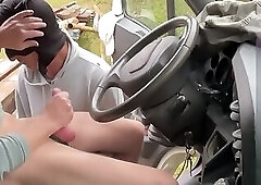 A masked guy sucks my big dick in the truck on a rest area