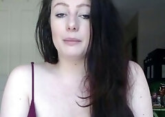 Busty curly brunette with big boobs fucks on couch