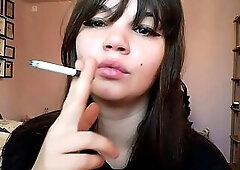 Brunette hair with natural large lips smokin' out of lip makeup