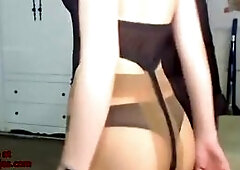 Asian model in tan pantyhose sexy striptease