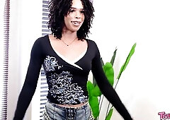 A in nature's garb Ebony trans woman with unshaved hair and red nails teases in pink pants in advance of sliding a sex toy unfathomable inside du