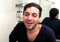 Dirty Tyler sits in the tub and starts jerking his thick uncut cock