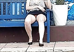 Sitting out of pants, with open legs