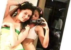 Carina 18 with lesbian babe selfie infront of mirror. They exposing tits and get naughty pose