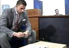 Cumming on the tie in the office