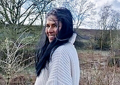 Long-haired babe pees in public with no panties