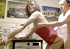 Passionate kitchen sex between Gigi and Dave, a horny housewife