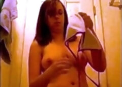Big-Titted Brunette Tries on Bikinis for Her Boyfriend's Web