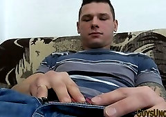 Buff hunk tugs uncut cock and cums