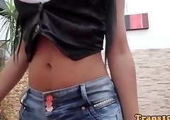 Latina tgirl fingers her ass and wanks