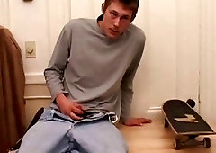 Horny jock Brent Stenson fucks his fist at the kitchen table