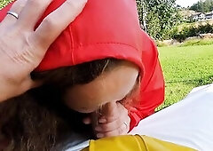 mother I'd like to fuck in latex leggings, raincoat and rubber boots giving oral job to gardener outdoors