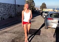 Alluring European babe stripteases and masturbates in public