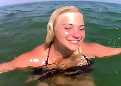 Naughty young babe shows off her wonderful body underwater