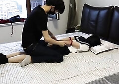 Ebony ankle socks and undressed feet versus white ankle socks, along with gags and rope restraints.