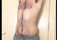 Gay shirtless, hairy chested stud, jerking off