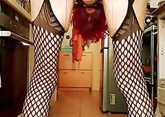 crossdresser with crimson periwig and black laces