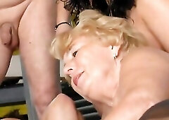 Have A Fun this kinky coupel of German Grannies haivng enjoyment with some youthful chaps in the auto shop . See in High Definition clip