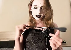 Clothed in a full ebony gothic outfit with sheer ebony hose and dramatic makeup, I entered the room like a mysterious little darksome pixie and starte