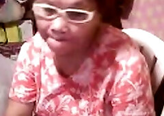 Mature Asian Elizabeth, 57, Flashes on Webcam