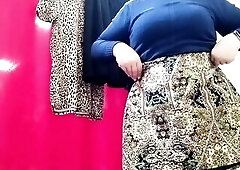 Mature milf tries on skirts in the mall on her big ass