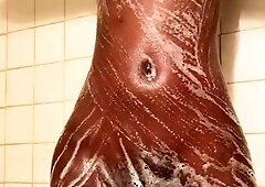 Sexy amateur chick taking a shower and masturbating