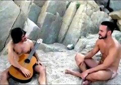 ginormous salami masturbing on the beach