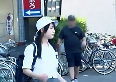 A man targets a girl in a uniform, groping her body and lifting her skirt to touch her buttocks.