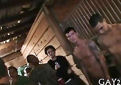 Young boys rub on each other