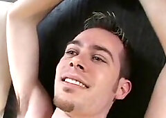 Adorable twunk enjoys having his feet tickled while giggling