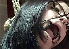 Tied up and clamped slave slut molested by BDSM master