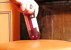 Horny shemale rides an improvised sex toy and cums hard