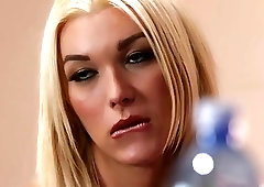 Blonde tranny in red lingerie gets on knees and sucks