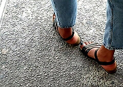 Beautiful Feet With Black Painted Toenails Of A Tall Antillean Girl (f