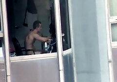 Hot neighbor caught wanking through window