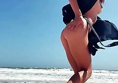 Teen Girl Public Masturbates on a Nude Beach, caresses Feet, and Guy jerks off Dick and Cums