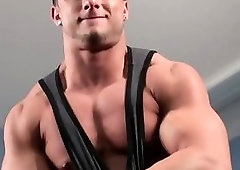 Muscular jock enjoys solo masturbation