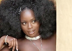 Aesthetic ebony model Elsie is playing with her sex toy