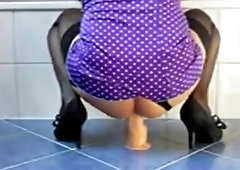 Crossdresser rides fat dildo 4