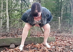 Babe urinates outside