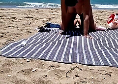 youthful woman gets banged on the beach by a stranger banging from behind