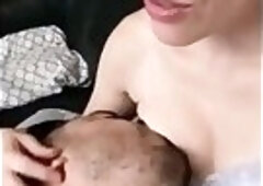 Sweet wife breastfeeds her husband until she cums