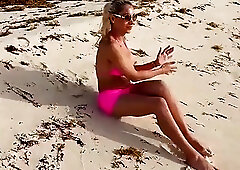 Pink bikini on the beach